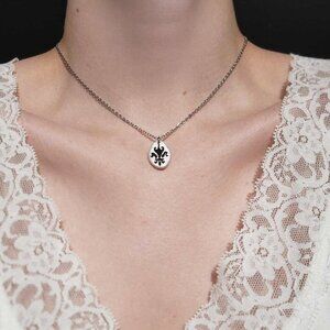 Gothic Fleur de Lys silver iridescent necklace with a small silver chain